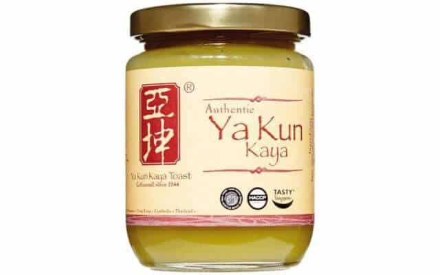 A jar of "Ya Kun Kaya," a traditional coconut and egg jam popular in Singapore. The label features the red Ya Kun logo with Chinese characters on the left, and text reading "Authentic Ya Kun Kaya" on the right.