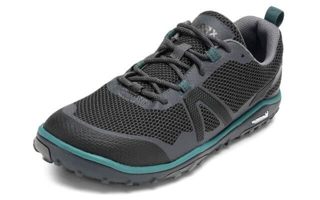 Xero Scrambler Low shoe in black and teal, featuring a zero-drop sole and low stack height for a natural, barefoot feel.