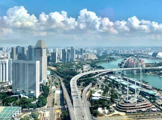 Aerial view of Singapore’s downtown skyline and expressways, illustrating the cityscape seen during a 24 Hours In Singapore solo travel experience.